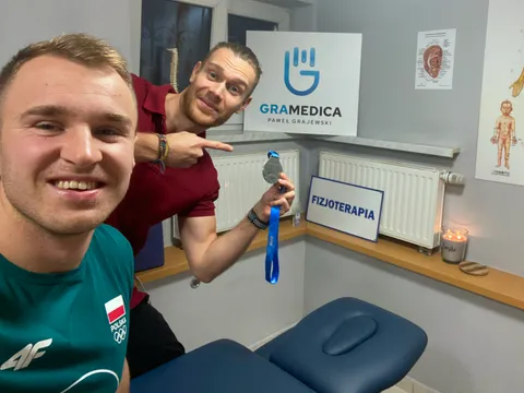 Paweł Grajewski with a Polish national team athlete