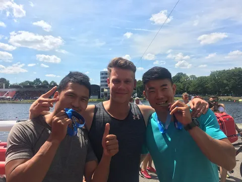 Celebrating with athletes at a rowing regatta